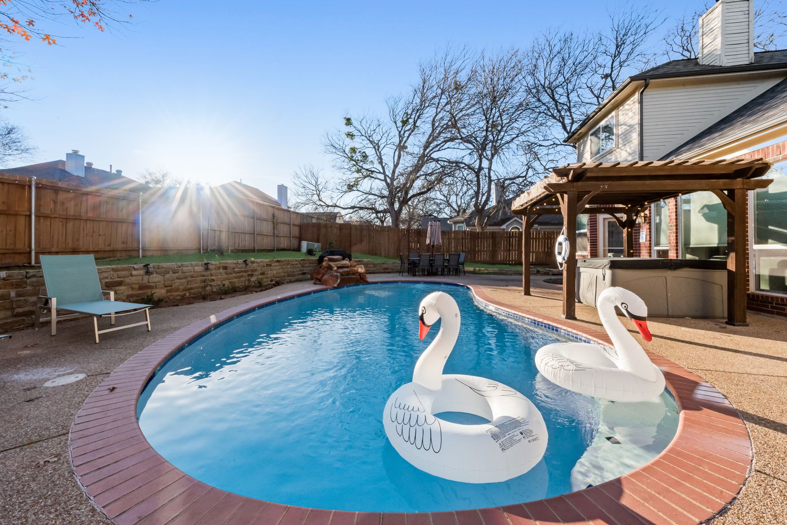 Pool with swan floats